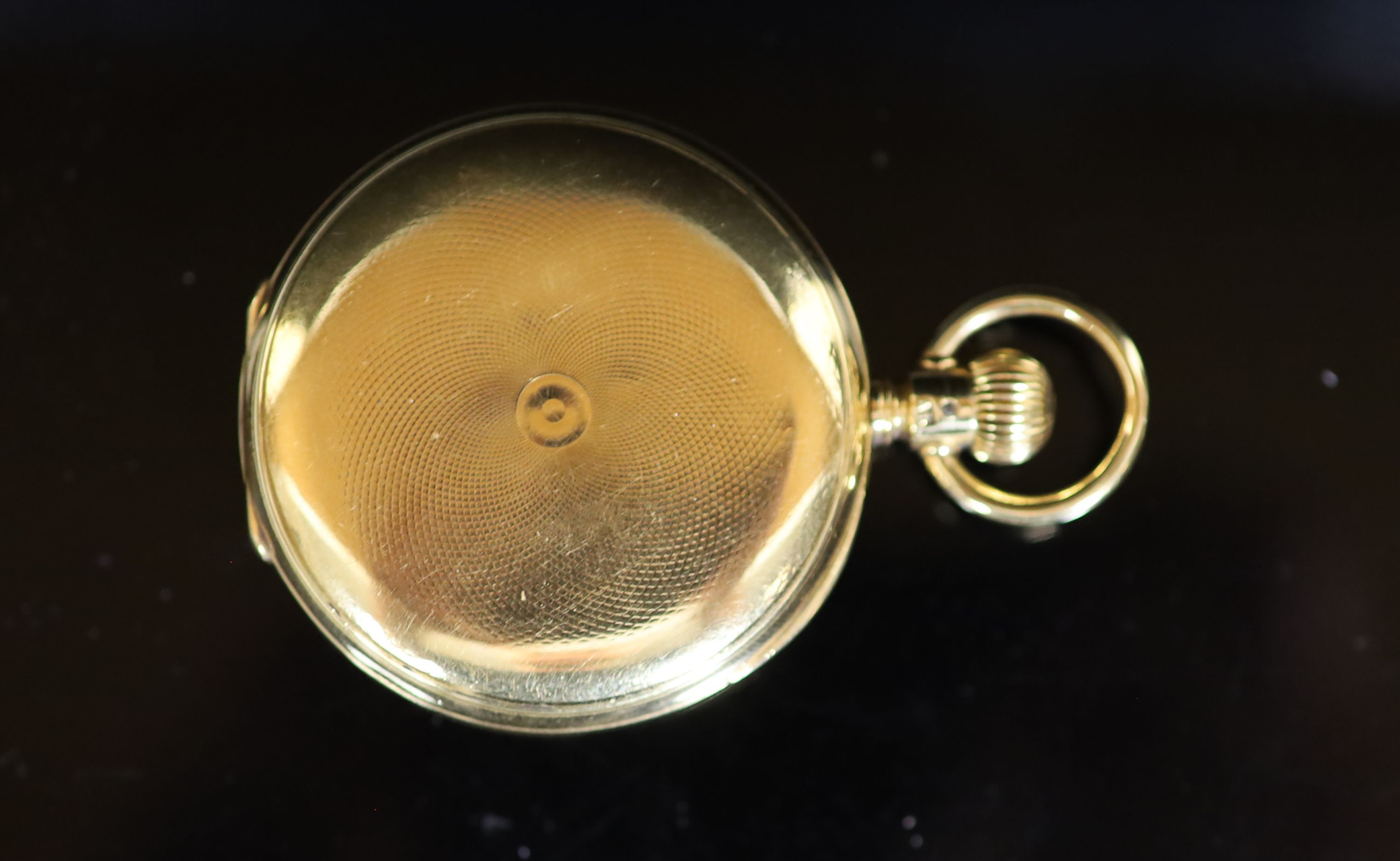 A late Victorian engine turned 18ct gold A W. Co Waltham hunter keyless lever pocket watch